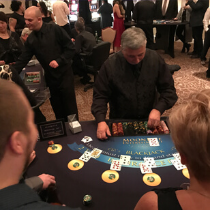 Black Jack dealer at the table